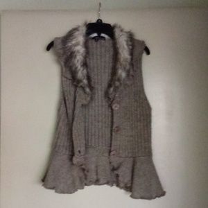 Fun sweater vest with fur like collar